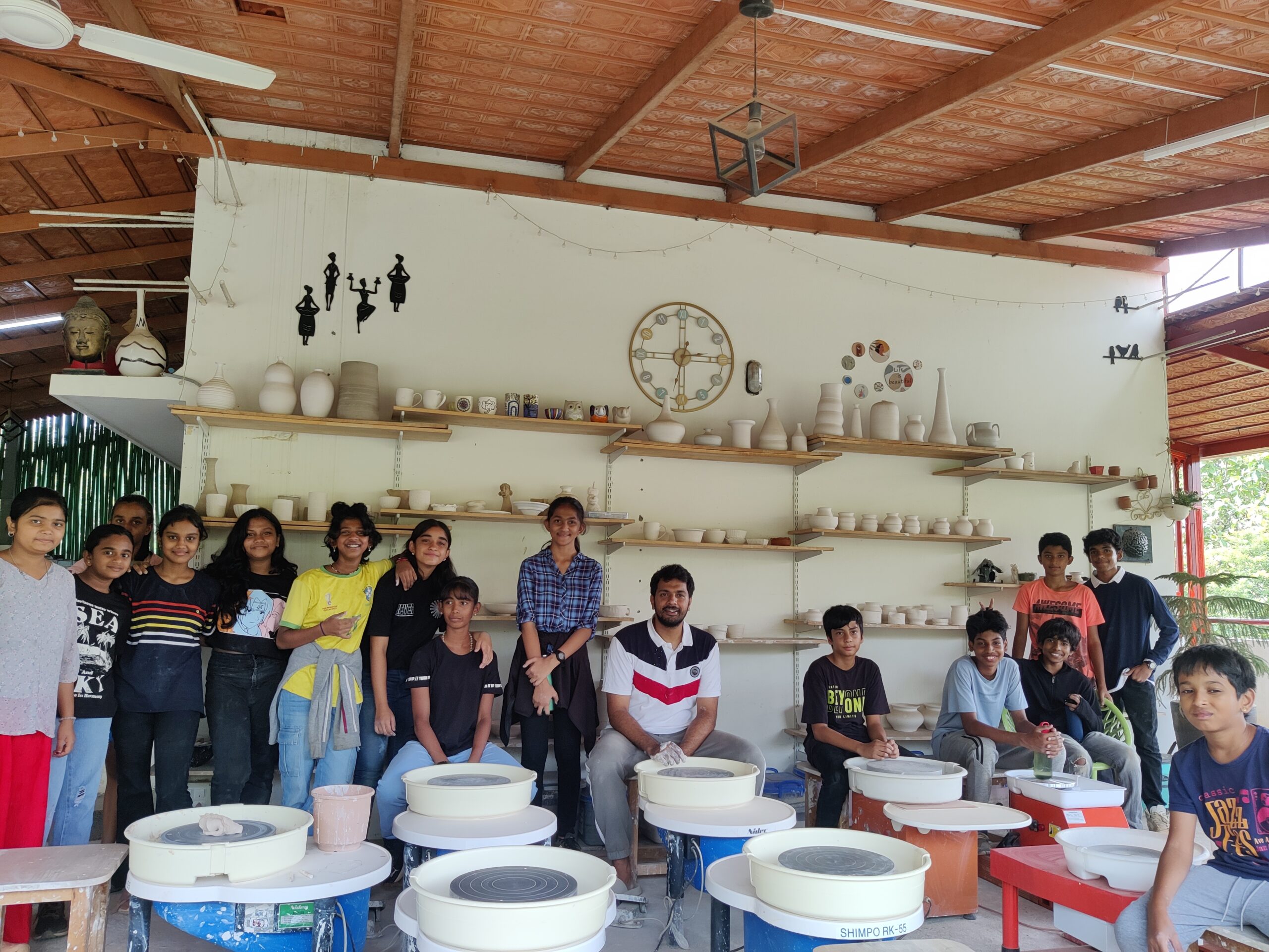 team group pottery events